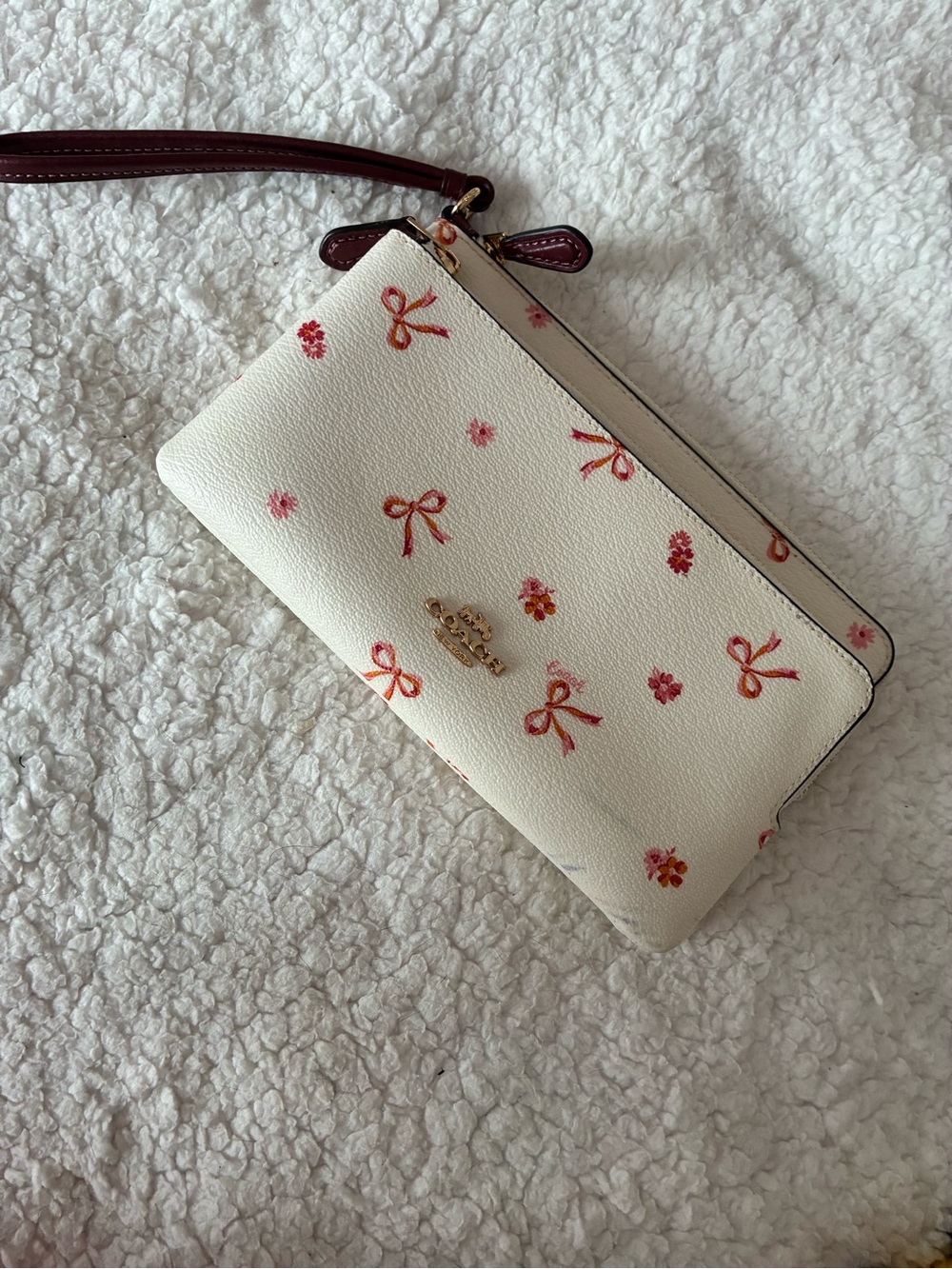 Coach Cream Floral & Bow Wristlet with Burgundy Strap